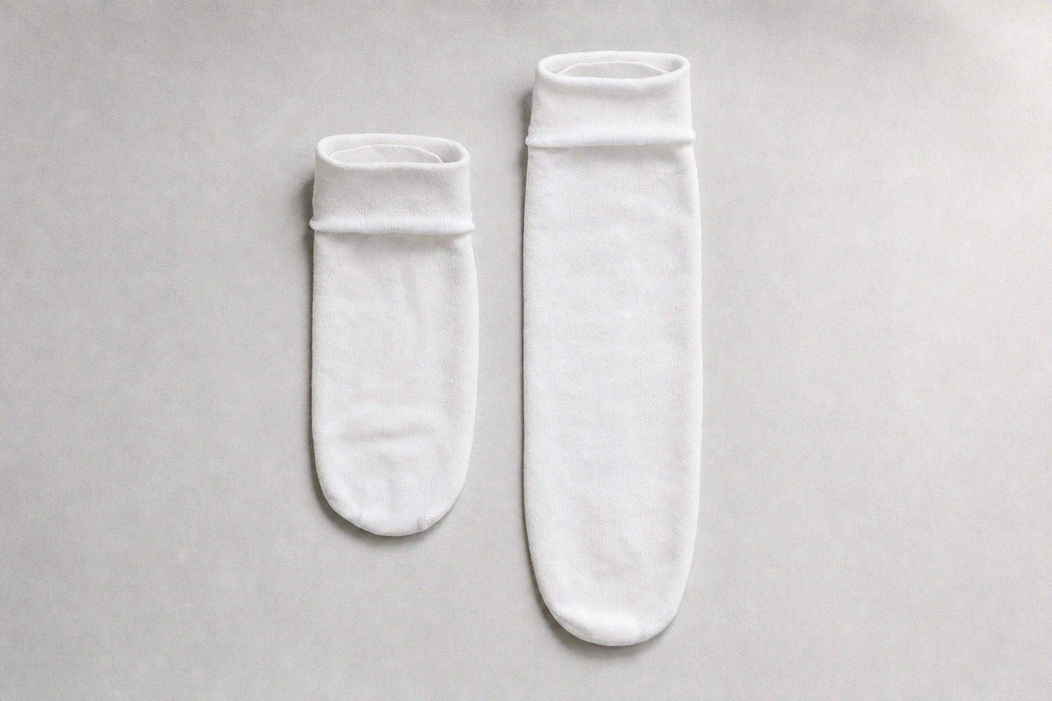 Pair of knitted stump socks with closed rounded ends